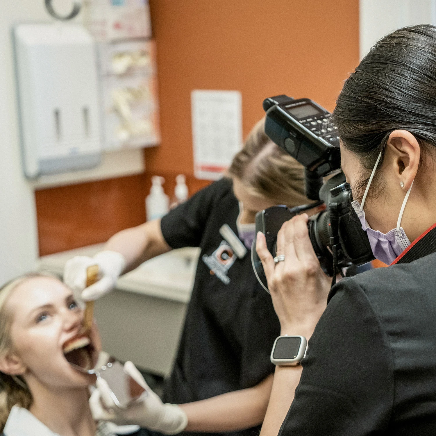 Teen patient having before treatment photos taken at Glenferrie Orthodontics